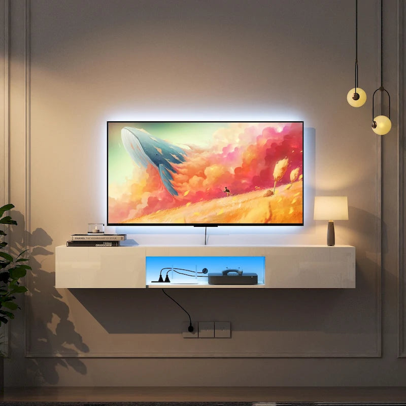 Meuble TV flottant blanc de 63 pouces avec rangement, lumières LED et prise de courant pour téléviseurs jusqu'à 60 pouces