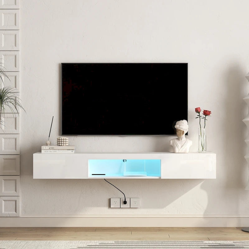 Meuble TV flottant blanc de 63 pouces avec rangement, lumières LED et prise de courant pour téléviseurs jusqu'à 60 pouces