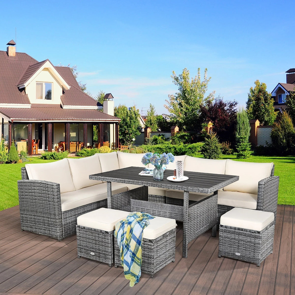 Ensemble de salle à manger Costway 7 pièces en rotin pour terrasse, canapé sectionnel et pouf - Voir détails