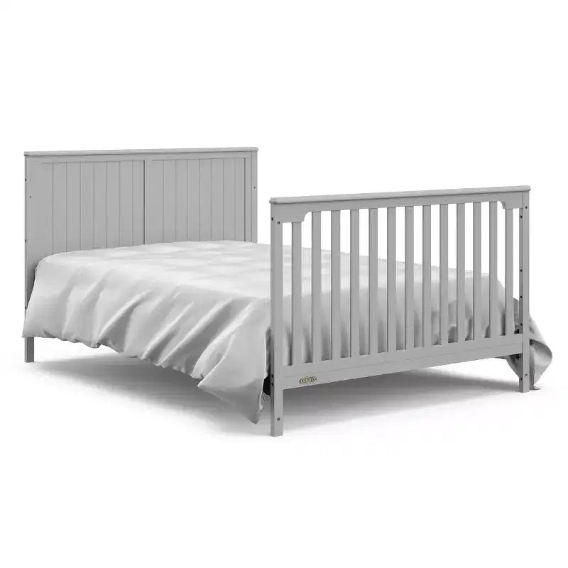 Lit de bébé et table à langer transformable 5-en-1 avec tiroir