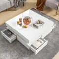 Table basse design brillante avec 4 tiroirs